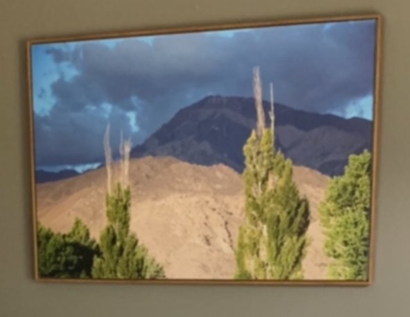 Photos mounted or printed on self-adhesive materials for wall hangings, wallpaper and more